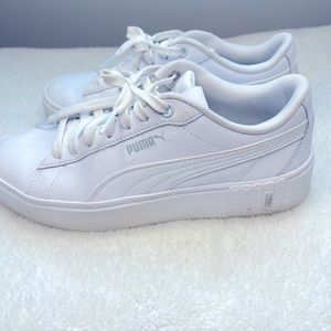 Women’s white puma sneakers. Size 7.